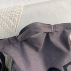 Bolso de lona estampada con asas de hombro ajustables