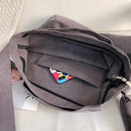 Bolso de lona estampada con asas de hombro ajustables