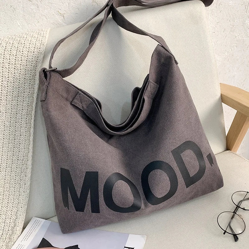 Bolso de lona estampada con asas de hombro ajustables