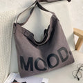 Bolso de lona estampada con asas de hombro ajustables