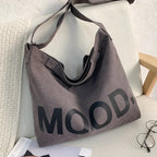Bolso de lona estampada con asas de hombro ajustables