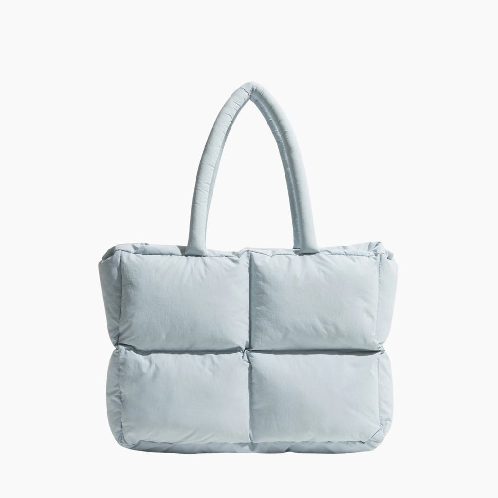 Rymlig puffer-axelväska med modern stil