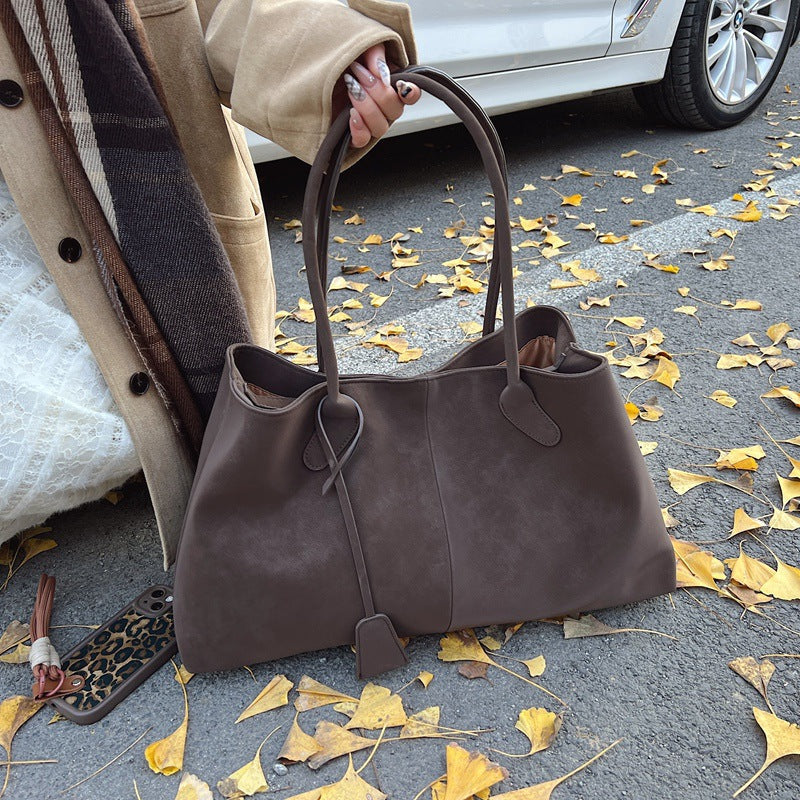 Rymlig totebag med plats för dator