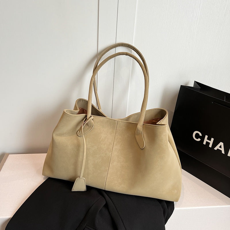 Rymlig totebag med plats för dator