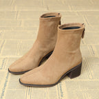 Botas con cremallera lateral y construcción suave y flexible