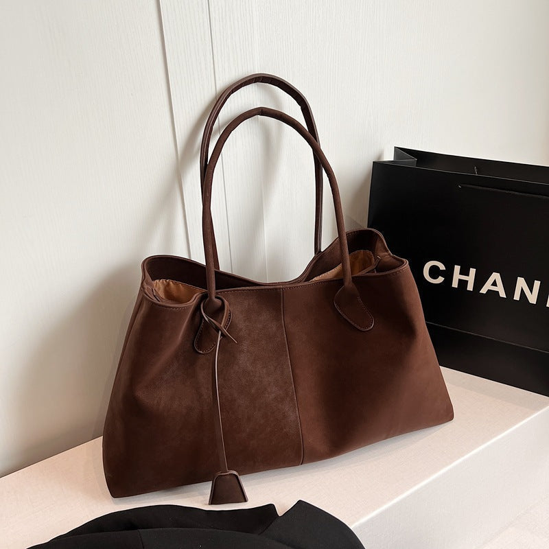 Rymlig totebag med plats för dator