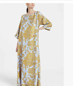 Vestido midi floral sin mangas con escote de pico