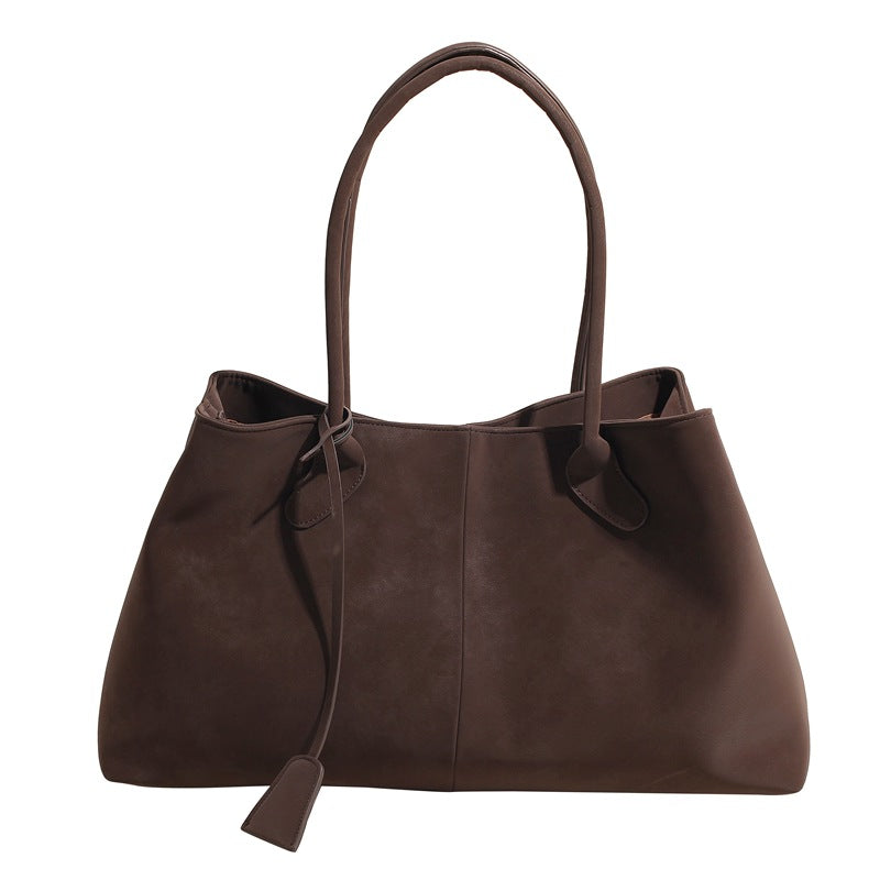 Rymlig totebag med plats för dator