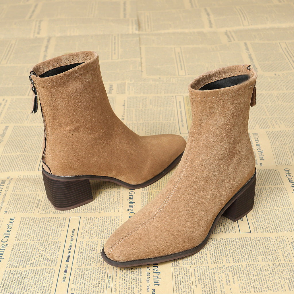 Botas con cremallera lateral y construcción suave y flexible