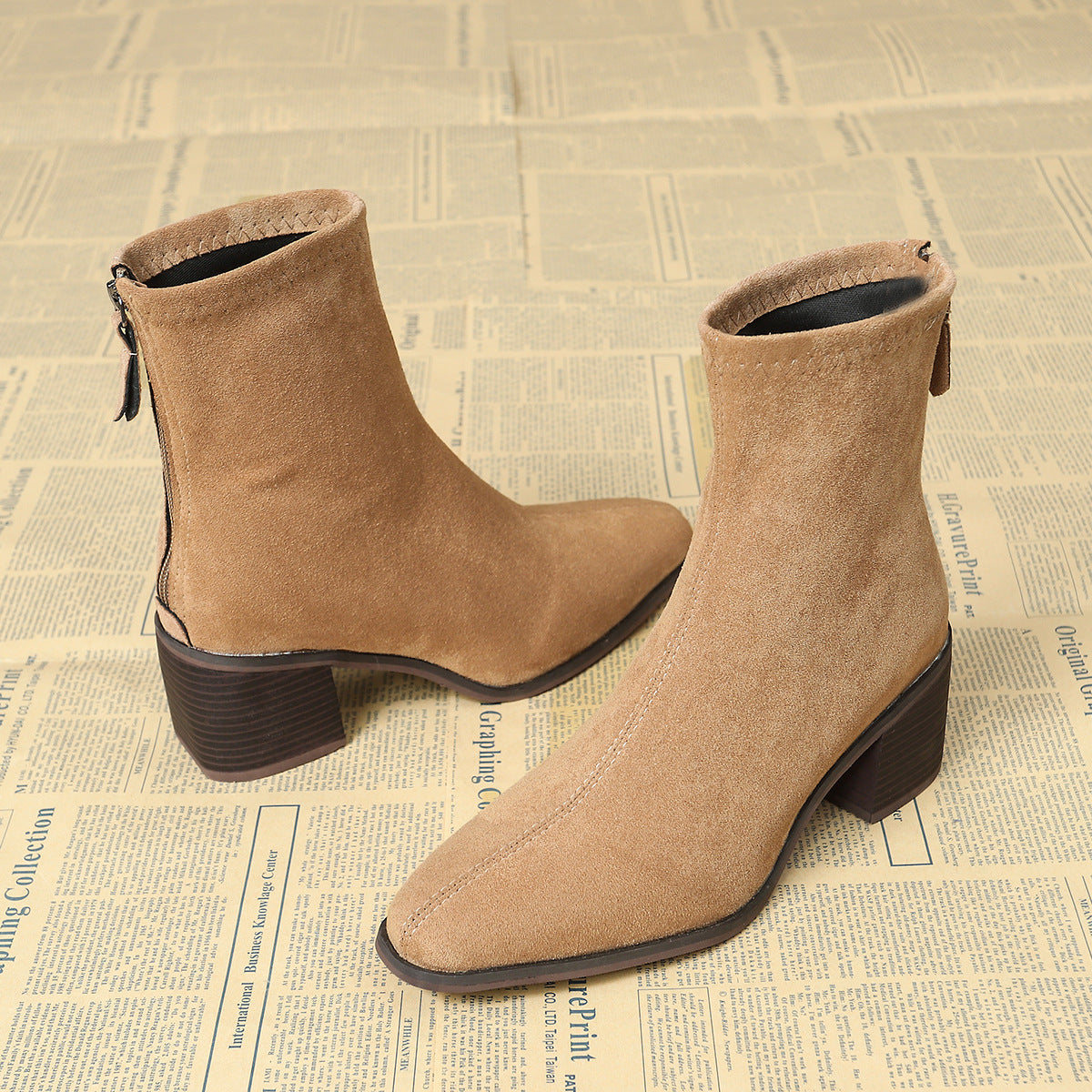 Botas con cremallera lateral y construcción suave y flexible