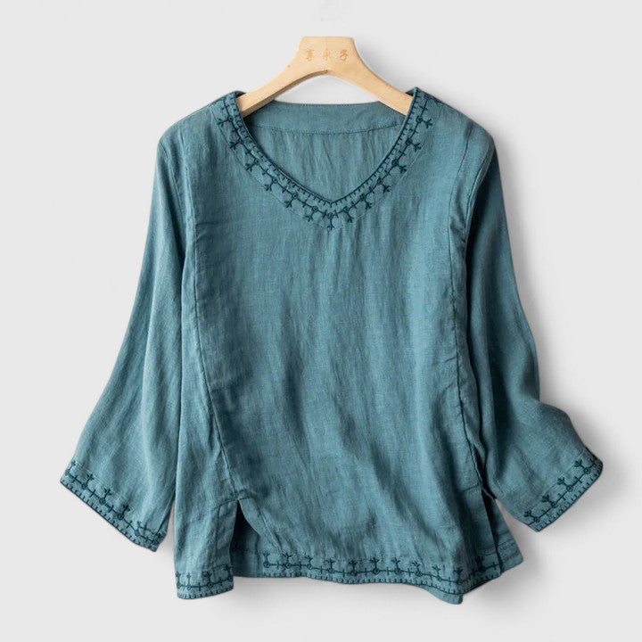 Blusa bordada con cuello de pico y corte holgado