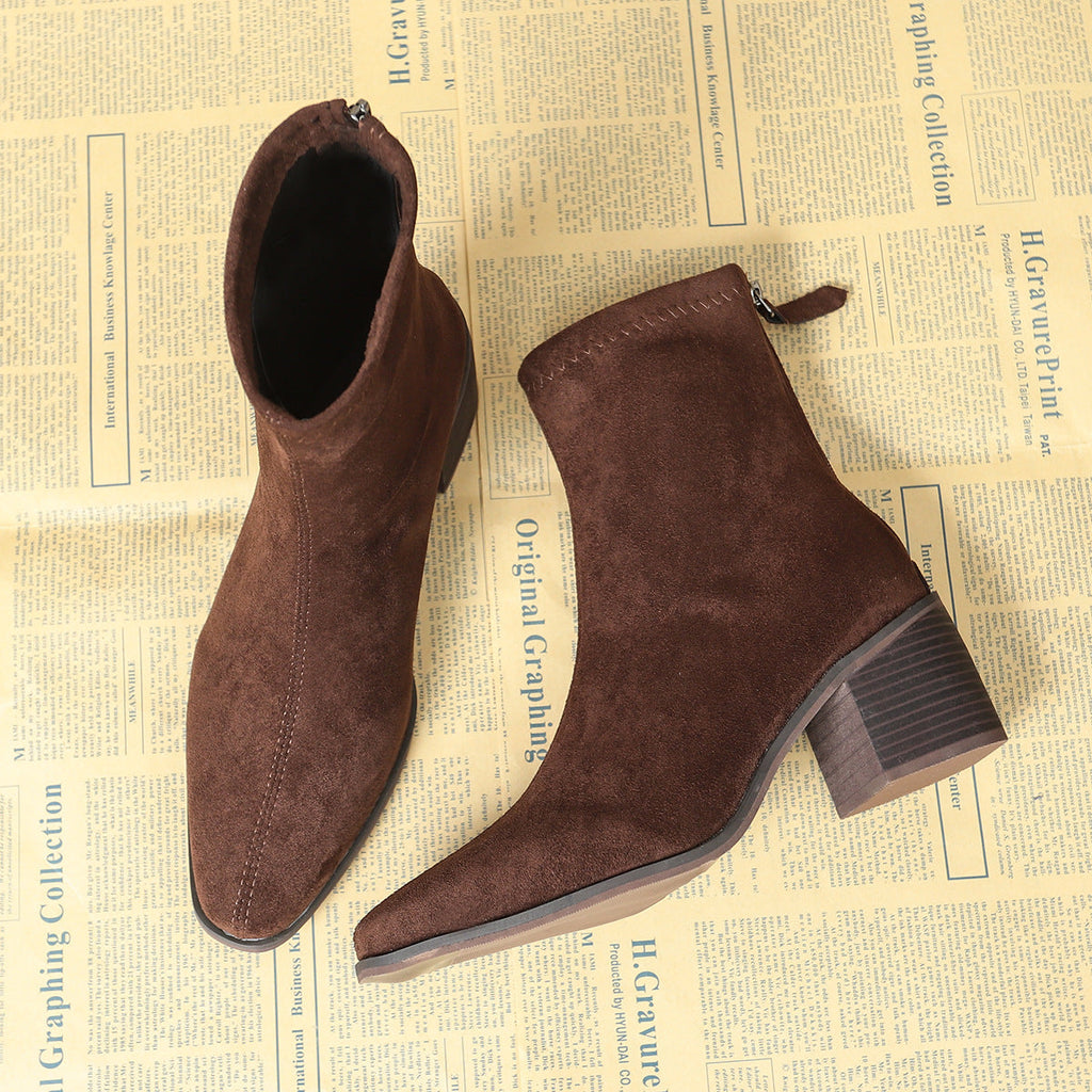 Botas con cremallera lateral y construcción suave y flexible