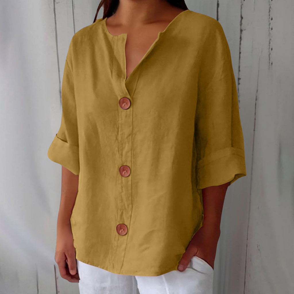 Blusa ligera de aspecto lino con bajo corto