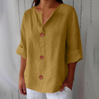 Blusa ligera de aspecto lino con bajo corto