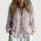 Blusa con estampado retro de hojas y corte moderno