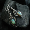 Swirl Earrings with Iridescent Stone in Silver Colour