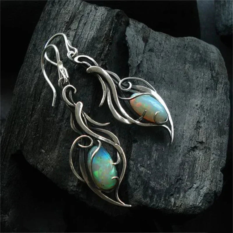 Swirl Earrings with Iridescent Stone in Silver Colour