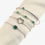 Gold-Tone Bracelet with Emerald and Zirconia Charm