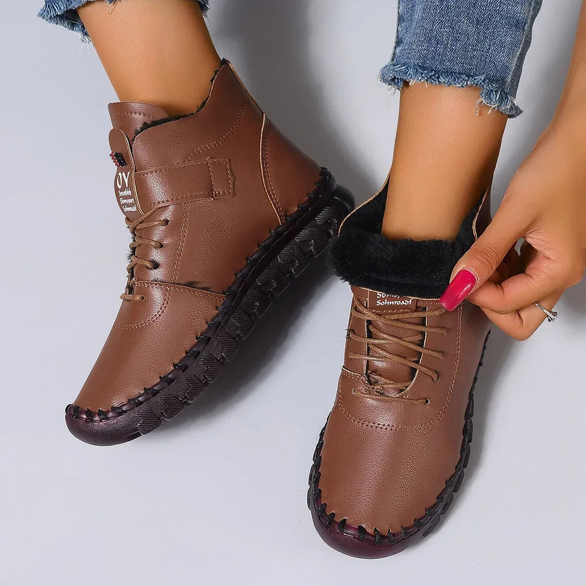 Botas de invierno forradas de borreguito con puntera redonda