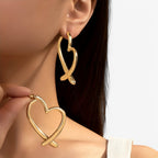 Personalised heart-shaped earrings in silver and gold tones
