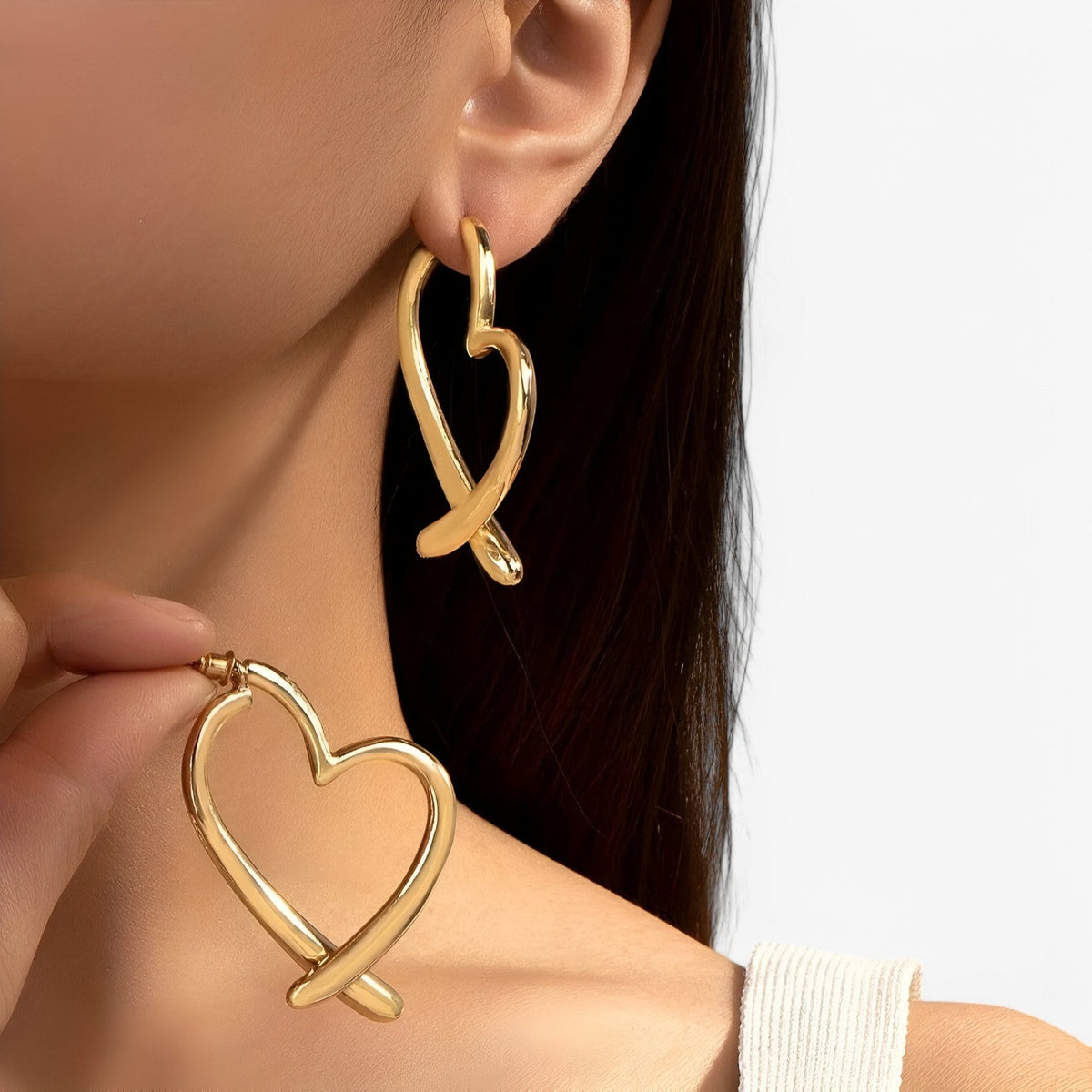 Personalised heart-shaped earrings in silver and gold tones