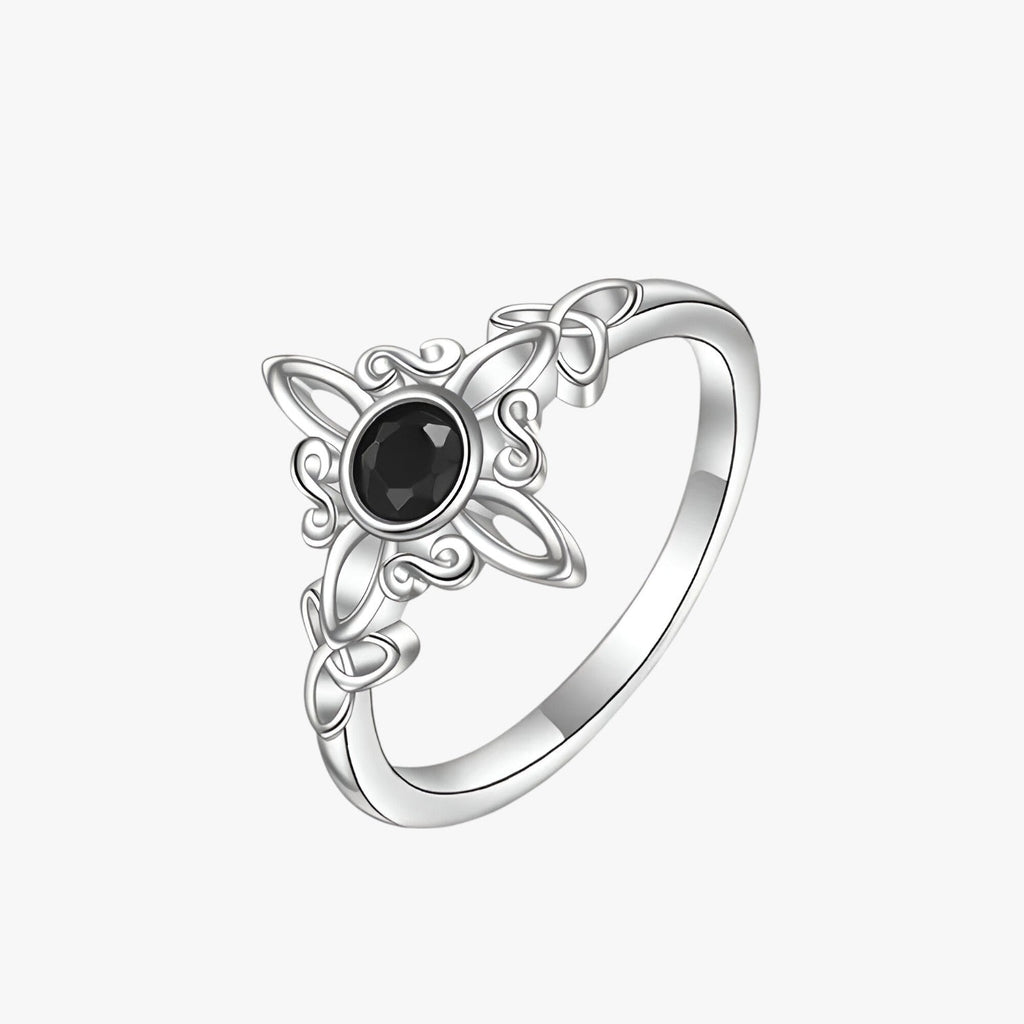 Silver-Tone Ring with Black Stone and Knot Design