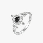 Silver-Tone Ring with Black Stone and Knot Design