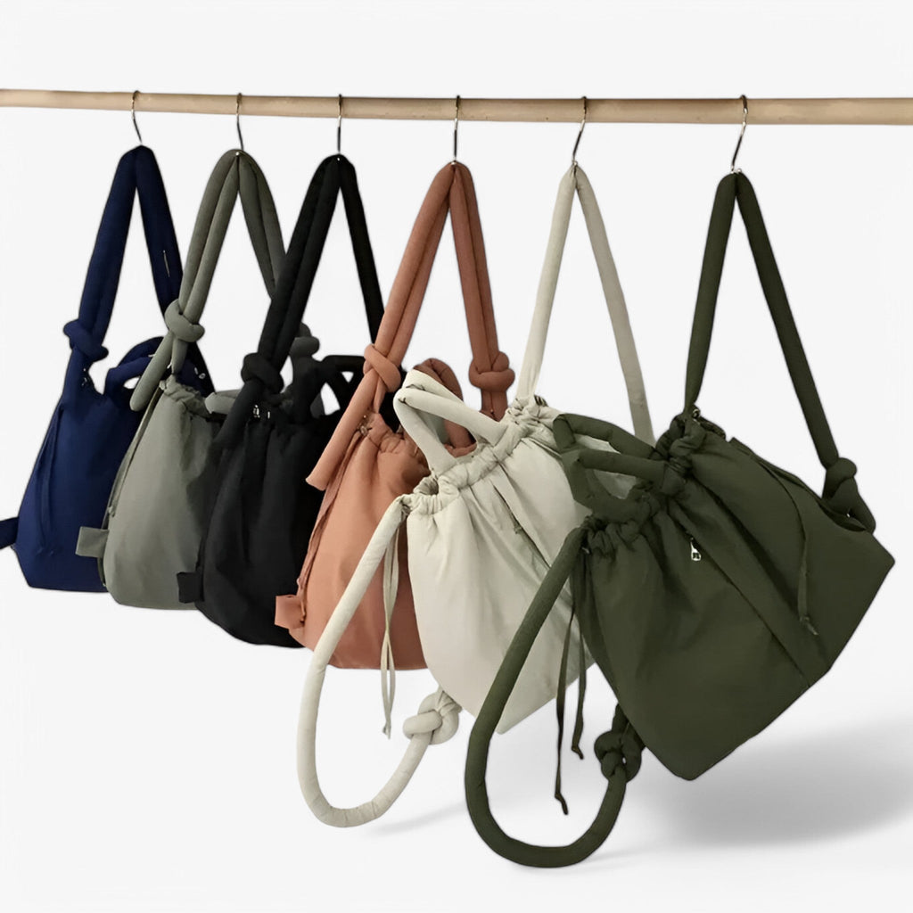 Bolso acolchado tipo puffer con correa de hombro ajustable