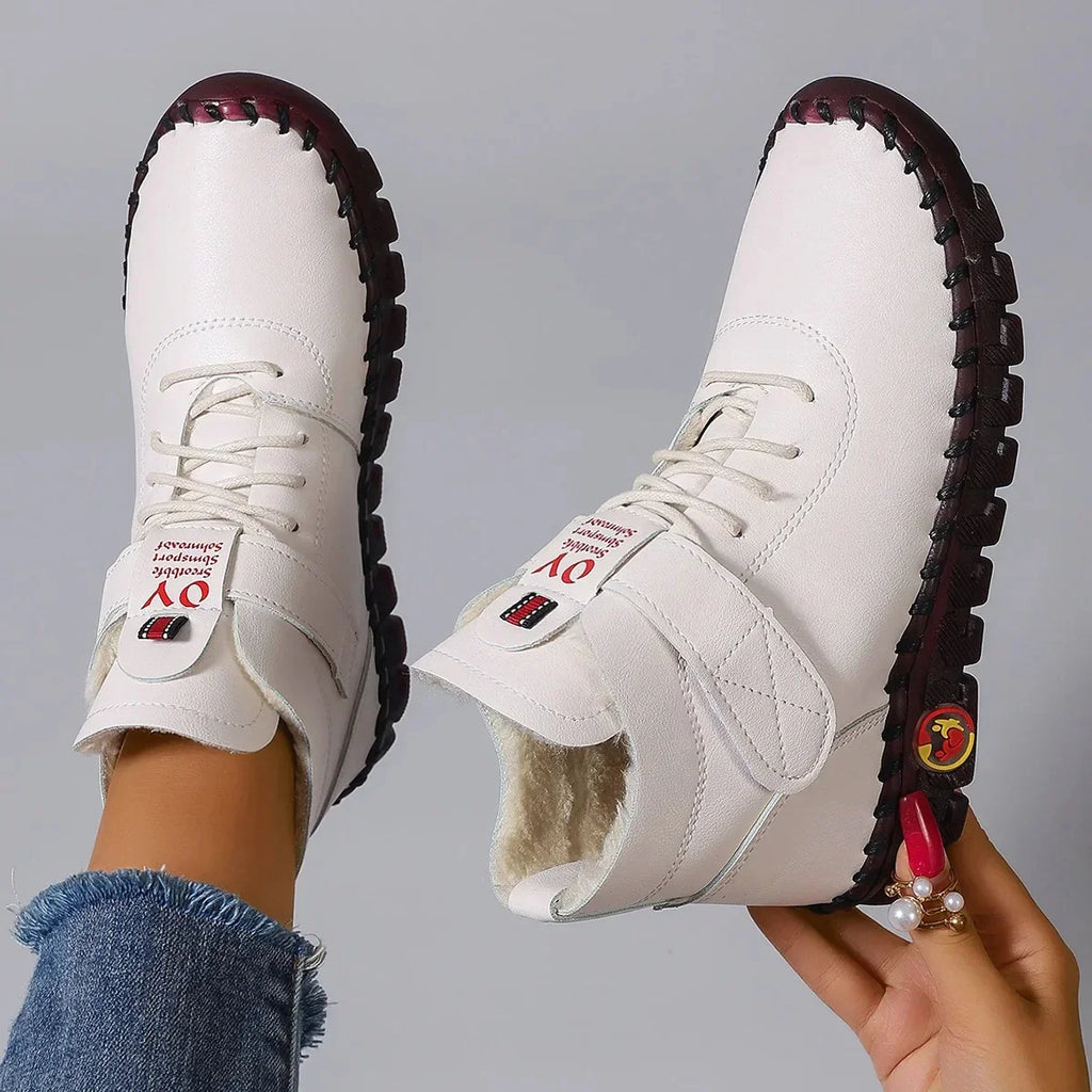 Botas de invierno forradas de borreguito con puntera redonda