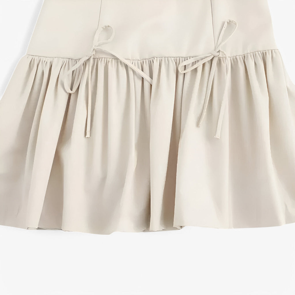 Sleeveless Pleated Mini Dress with Bow Detail