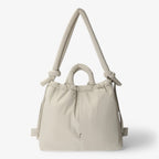 Bolso acolchado tipo puffer con correa de hombro ajustable