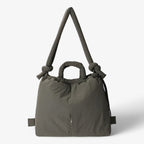 Bolso acolchado tipo puffer con correa de hombro ajustable