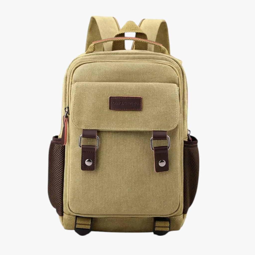 Mini mochila de lona con ribetes de piel sintética