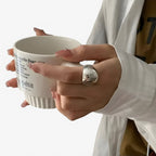 Adjustable Silver-Tone Ring with a Minimalist Design