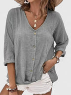 Blusa ligera con cuello de pico y comodidad vaporosa
