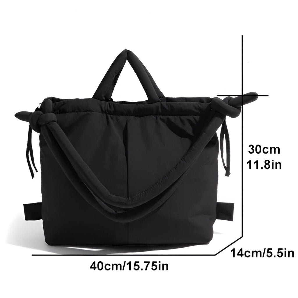 Bolso acolchado tipo puffer con correa de hombro ajustable