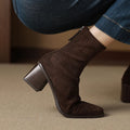 Botas con cremallera lateral y construcción suave y flexible