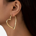 Personalised heart-shaped earrings in silver and gold tones
