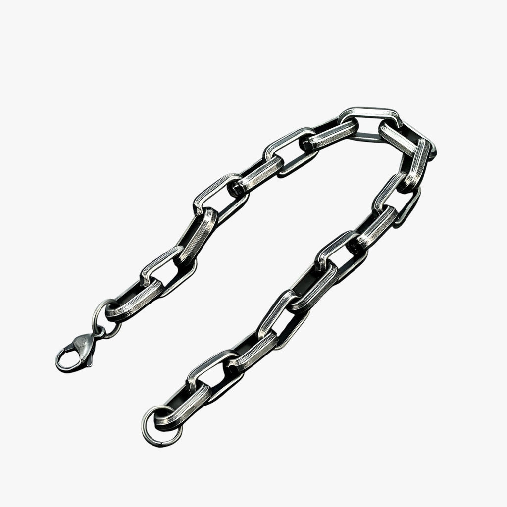 Pulsera de hombre de eslabones de acero inoxidable en negro y dorado