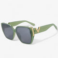 Vintage V-Shaped Mirrored Sunglasses with a Retro-Futuristic Edge