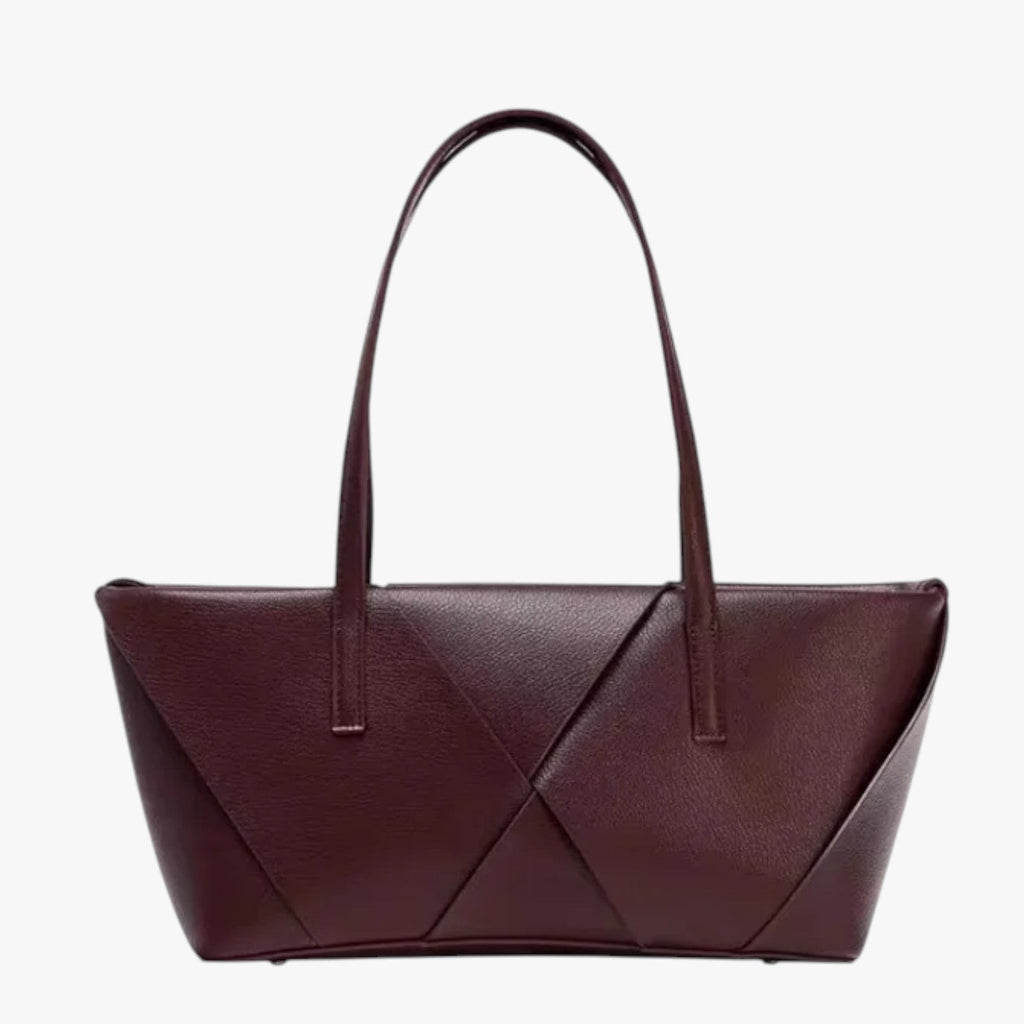 Strukturerad crossbodyväska i konstläder med justerbar rem