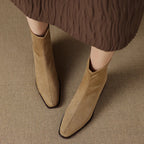 Botas con cremallera lateral y construcción suave y flexible