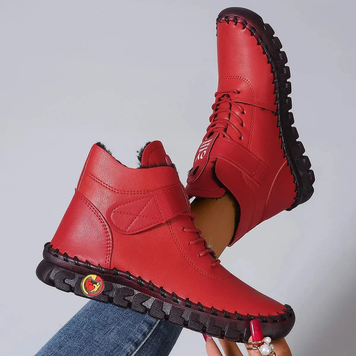 Botas de invierno forradas de borreguito con puntera redonda