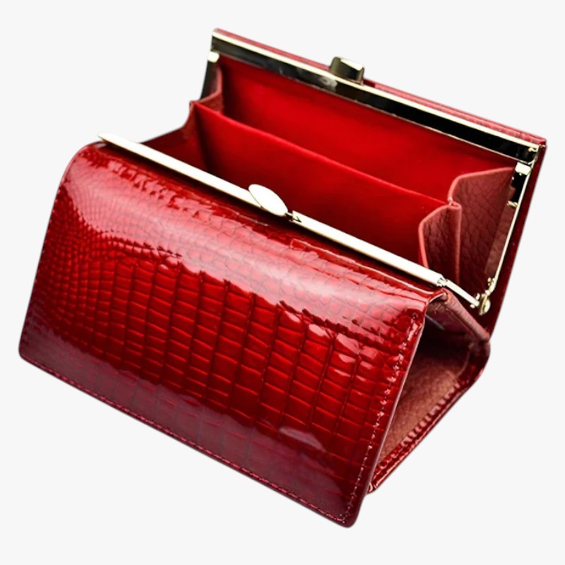 Cartera clutch de piel sintética con estampado de serpiente y correa de mano
