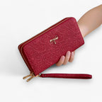 Cartera retro con detalle de encaje en relieve y múltiples compartimentos