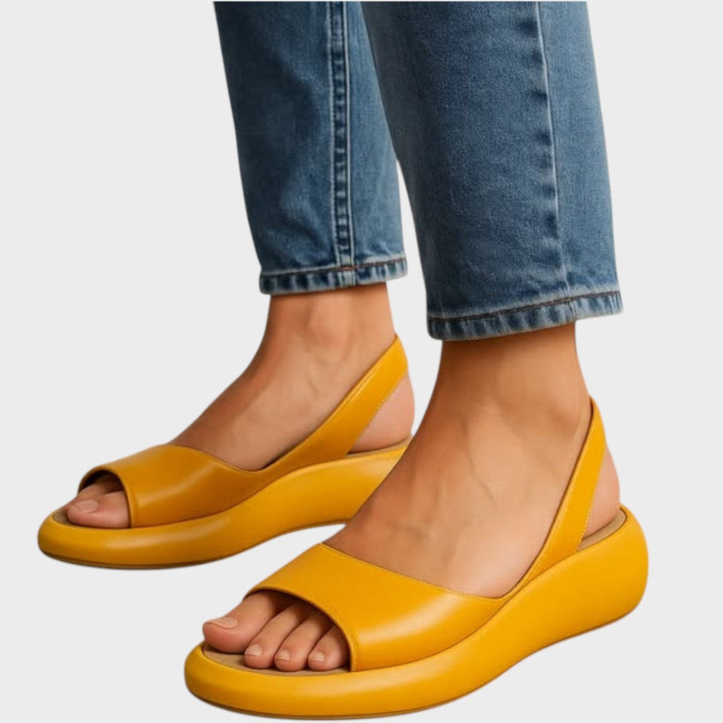 Slip in-sandaler med vadderad innersula och lätt sula