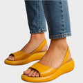 Slip in-sandaler med vadderad innersula och lätt sula