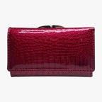 Cartera clutch de piel sintética con estampado de serpiente y correa de mano