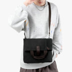 Bolso de hombro de lona con correa ajustable para el trabajo y los viajes