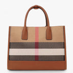 Bolso espacioso de lona de cuadros con correa ajustable